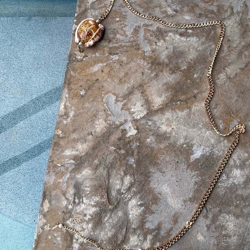 Handmade resin with gold flakes shells from Hawaii. Belt or belly chain